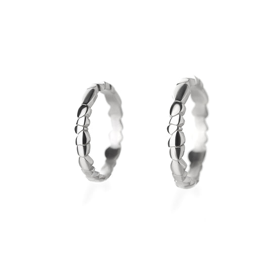 Raindrops curb white gold wedding rings
