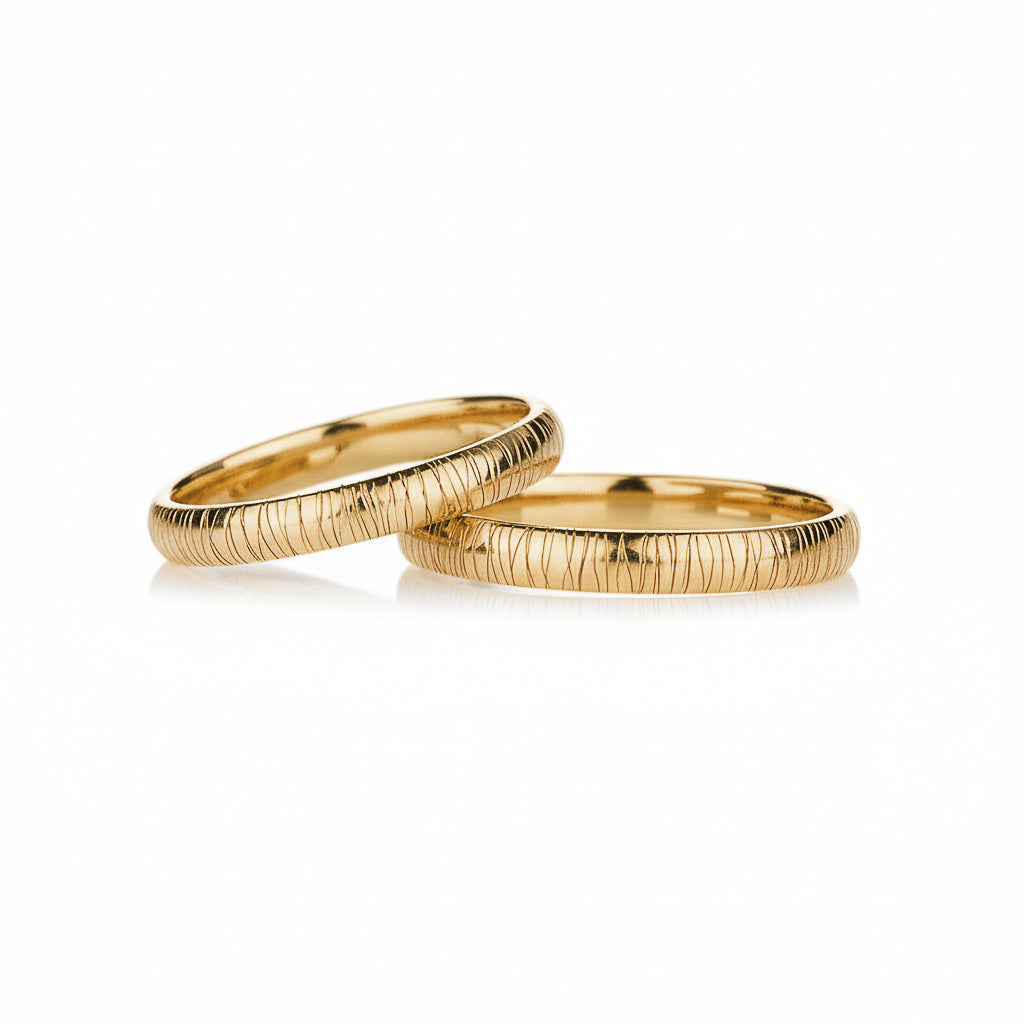 Linea_textured_yellow_gold_wedding_rings