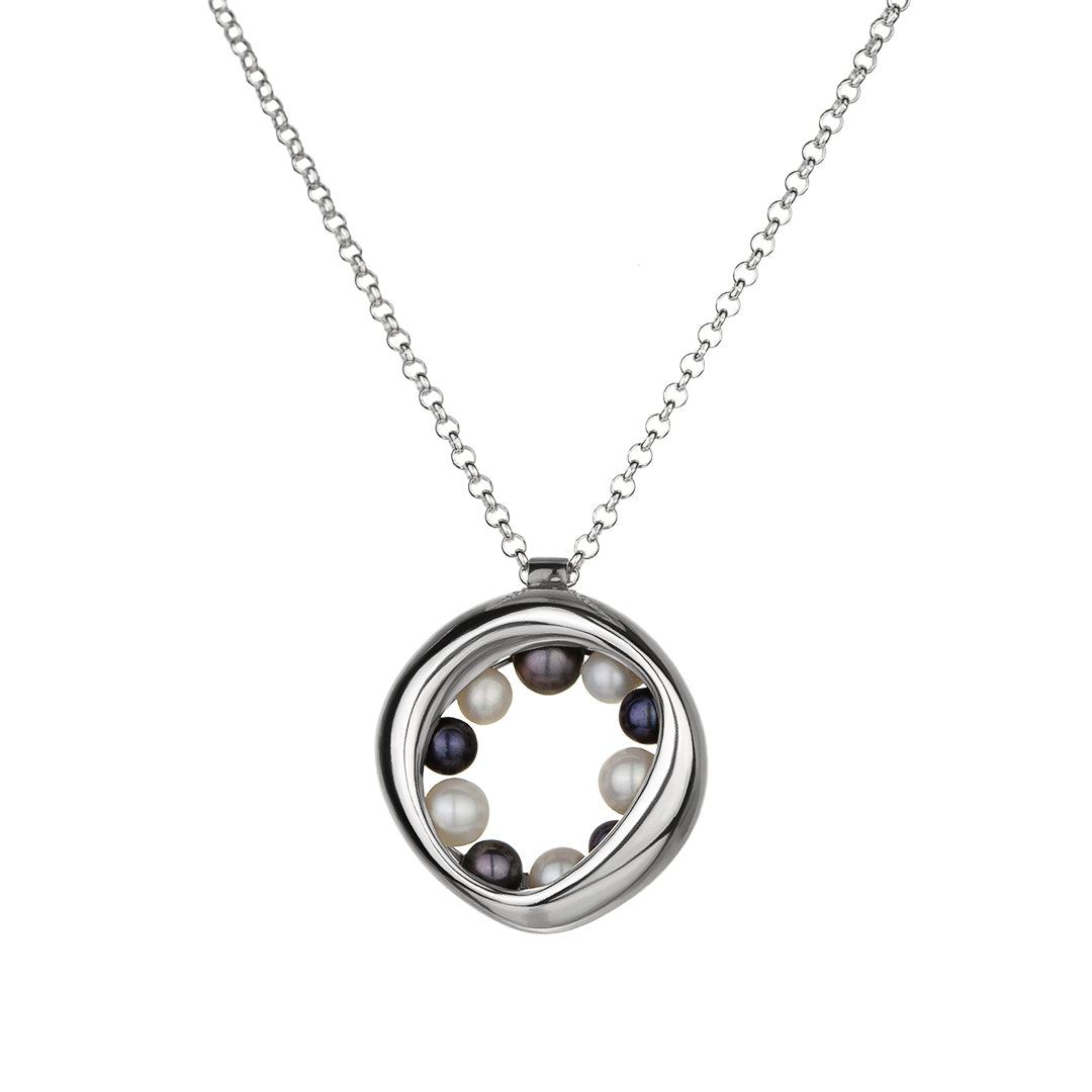 14KT white gold necklace with a circular, organic pendant featuring black and white pearls 