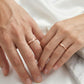 Pair of rose gold twig-shaped wedding rings