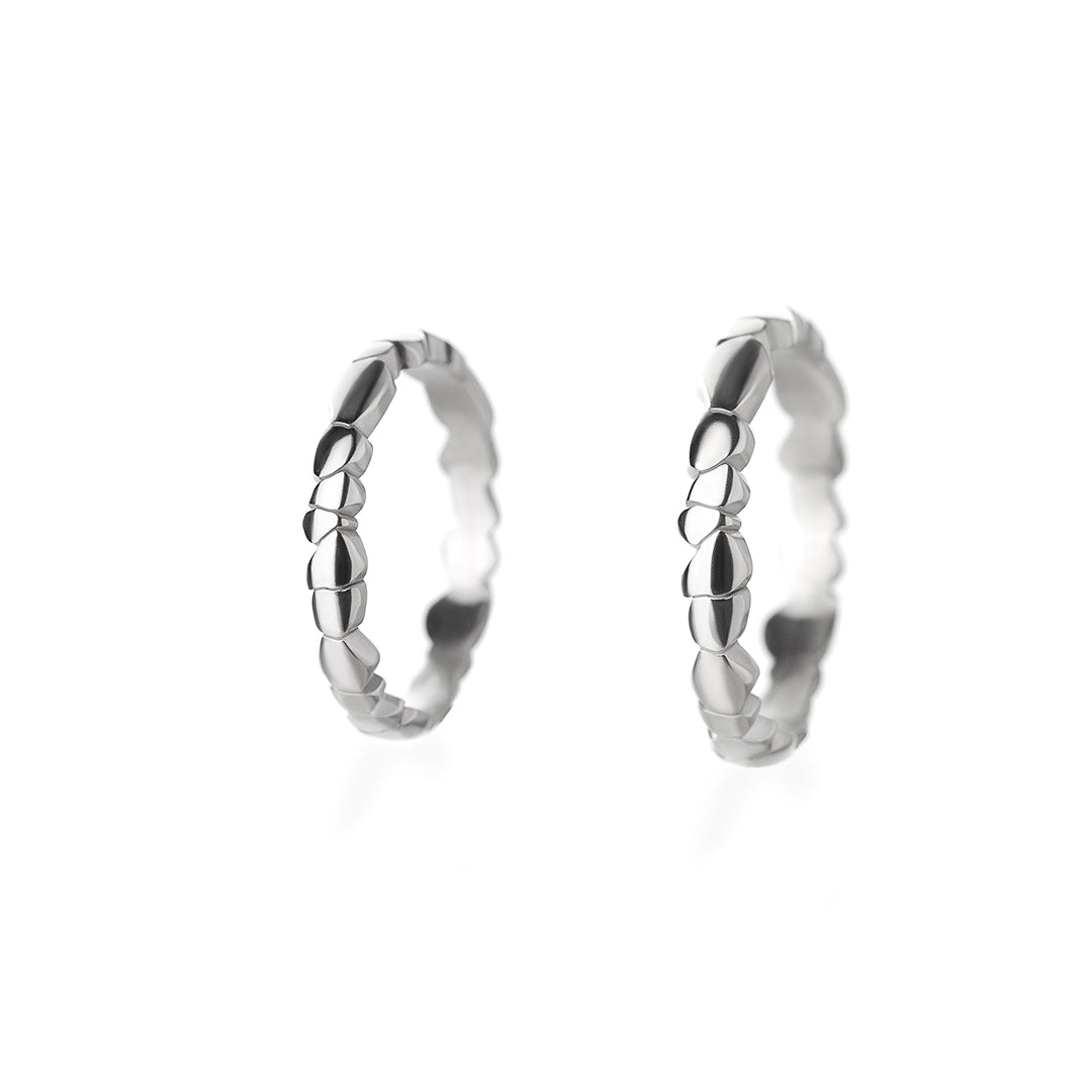 Raindrops curb white gold wedding rings