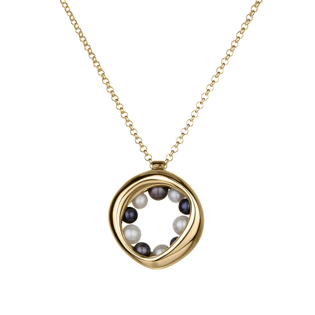 14KT yellow gold necklace with a circular, organic pendant featuring black and white pearls 